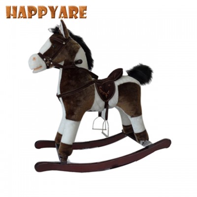 kid riding on animal horse toy rocking horse