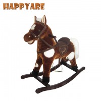 kid riding on animal horse toy rocking horse