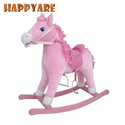 kid riding on animal horse toy rocking horse